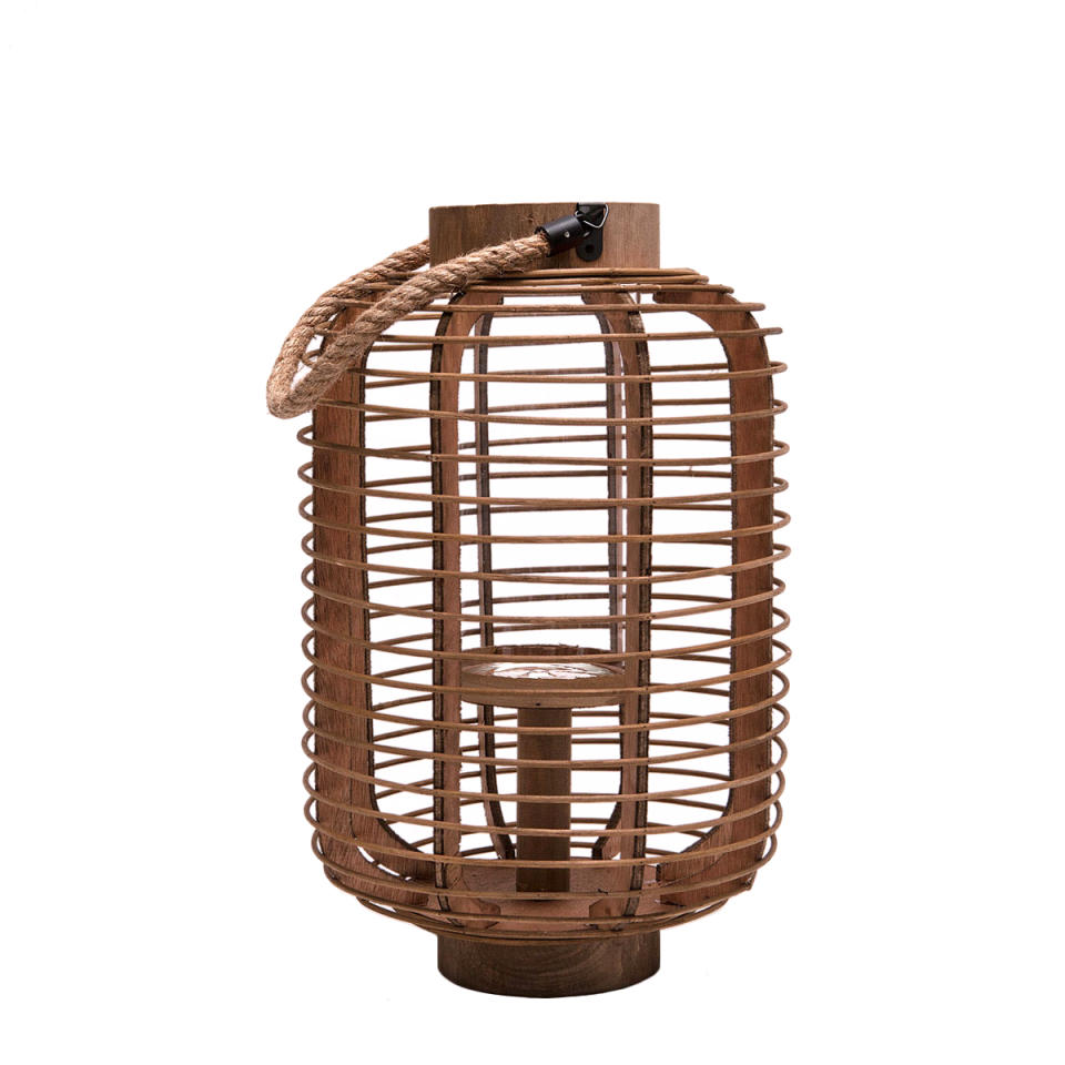 <p><a rel="nofollow noopener" href="https://www.zarahome.com/us/decoration/organic-craft-collection/lantern-with-a-wooden-structure-and-jute-handle-c1020049516p300032337.html" target="_blank" data-ylk="slk:Lantern with a Wooden Structure and Jute Handle;elm:context_link;itc:0;sec:content-canvas" class="link ">Lantern with a Wooden Structure and Jute Handle</a>, $70</p>