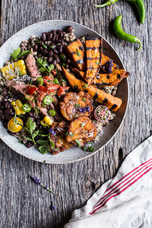 <strong>Get the <a href="http://www.halfbakedharvest.com/brazilian-steak-and-grilled-sweet-potato-fry-quinoa-bowl-with-spicy-coconut-tomato-sauce/">Brazilian Steak and Grilled Sweet Potato Fry Quinoa Bowl with Spicy Coconut Tomato Sauce recipe</a>&nbsp;from Half Baked Harvest</strong>