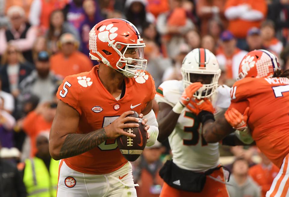 Action during the game between Clemson and Miami at Memorial Stadium in Clemson, South Carolina Saturday, Nov. 19, 2022.   Clemson quarterback D.J. Uiagalelei (5) in the pocket on a passing play. 