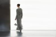 A model wears a creation for Fendi as part of the Haute Couture Spring-Summer 2024 collection presented in Paris, Thursday, Jan. 25, 2024. (AP Photo/Thibault Camus)