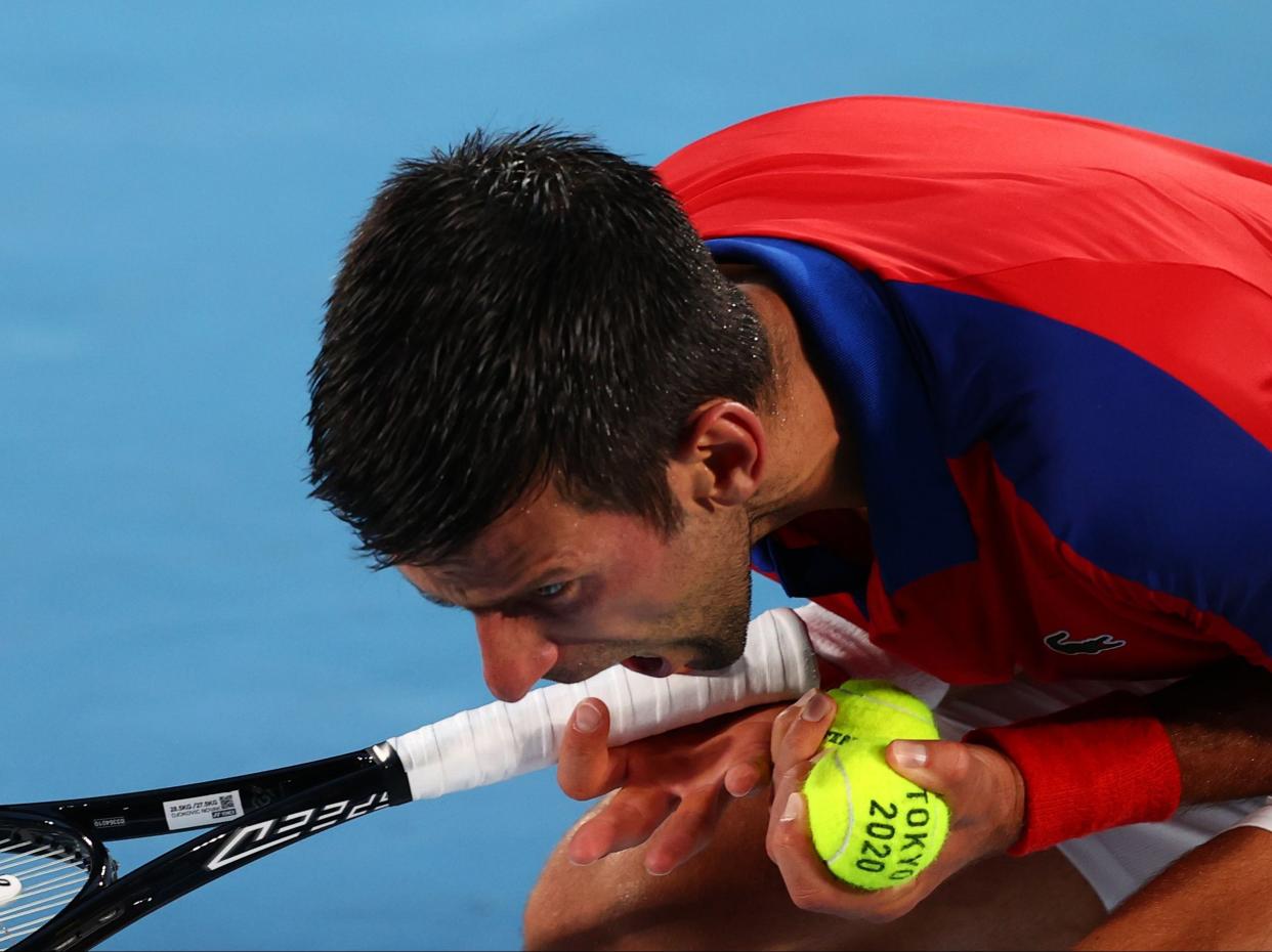 Novak Djokovic reacts during his defeat by Alex Zverev (Reuters)