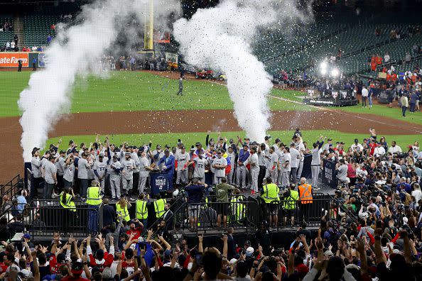 HOUSTON, TEXAS - NOVEMBER 02:  The Atlanta Braves celebrate their 7-0 victory against the Houston Astros in Game Six to win the 2021 World Series at Minute Maid Park on November 02, 2021 in Houston, Texas. (Photo by Bob Levey/Getty Images)