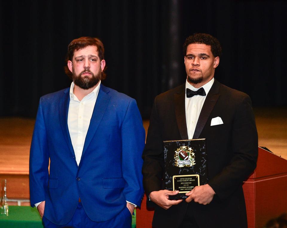 GNBVT's Isander Algarin and head coach Justin Cruz during Wednesday's Otto Graham award ceremony.