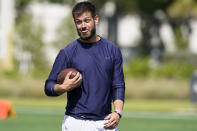 Pittsburgh quarterback Jeff George Jr. waits for the quarterback drills to start during an NFL football mini combine organized by House of Athlete, Friday, March 5, 2021, in Fort Lauderdale, Fla.. (AP Photo/Marta Lavandier)