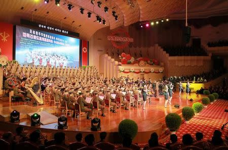 People perform during a celebration for nuclear scientists and engineers who contributed to a hydrogen bomb test, in this undated photo released by North Korea's Korean Central News Agency (KCNA) in Pyongyang on September 10, 2017. KCNA via REUTERS