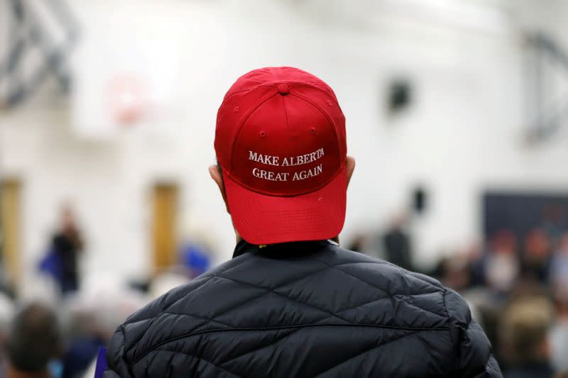 FILE PHOTO: A supporter attends a rally for Wexit Alberta, a separatist group seeking federal political party status, in Calgary