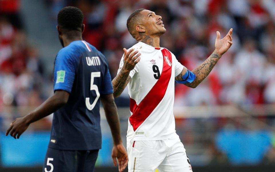 Peru's Paolo Guerrero reacts as he's show a yellow card during France vs Peru - How Paolo Guerrero's desperation led to Peru's downfall - REUTERS