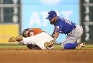 May 11, 2018; Houston, TX, USA; Houston Astros right fielder Josh Reddick (22) is safe on a play at second base as Texas Rangers second baseman Rougned Odor (12) attempts to apply a tag during the eighth inning at Minute Maid Park. Mandatory Credit: Troy Taormina-USA TODAY Sports