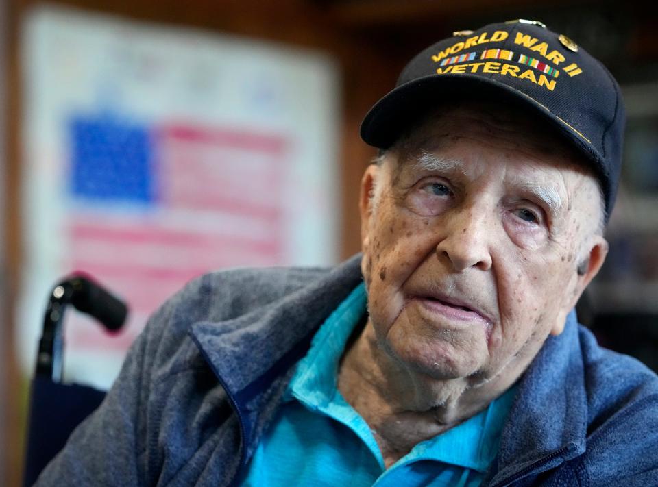 World War II veteran Harry Clement, 95, of Edgewater, talks about his service in the U.S. Army in Germany during the final days of the war at the AmVets Post No. 2 in Edgewater. He will be among a small number of World War II veterans to be on stage Sunday at a Pearl Harbor Day event at Hawks Park in Edgewater.