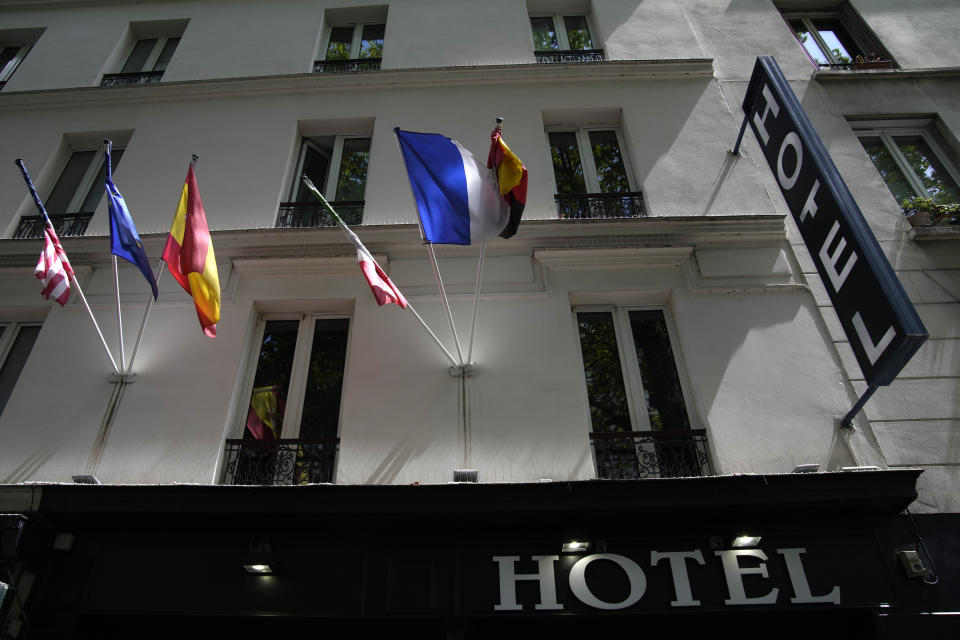 A hotel facade is pictured in Paris Thursday, July 20, 2023. Paris touted its large and diverse accommodation options – everything from campsites along the River Seine to some of the world's most famous luxury hotels – when it was bidding for the Games, boasting that it has "more than sufficient accommodation" to host France's first Summer Games in a century and millions of Olympic visitors. (AP Photo/Christophe Ena)