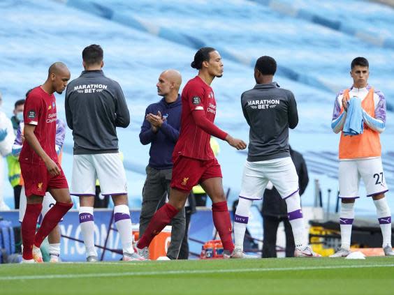 Virgil van Dijk walks through the guard of honour (2020 Pool)