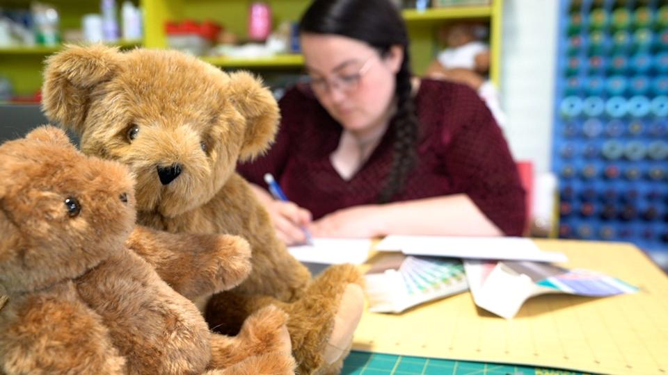 Cassandra Clayton at her workshop in the Vermont Teddy Bear factory in Shelburne on May 5, 2023.