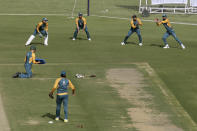 Players of Pakistan Cricket Team attend a practice session for an upcoming test match against South Africa at National Stadium, in Karachi, Pakistan, Friday, Jan. 22, 2021. Pakistan will play the first test match on Jan. 26, against South Africa, who arrived in the southern port city of Karachi last Saturday for the first time in nearly 14 years. (AP Photo/Fareed Khan)