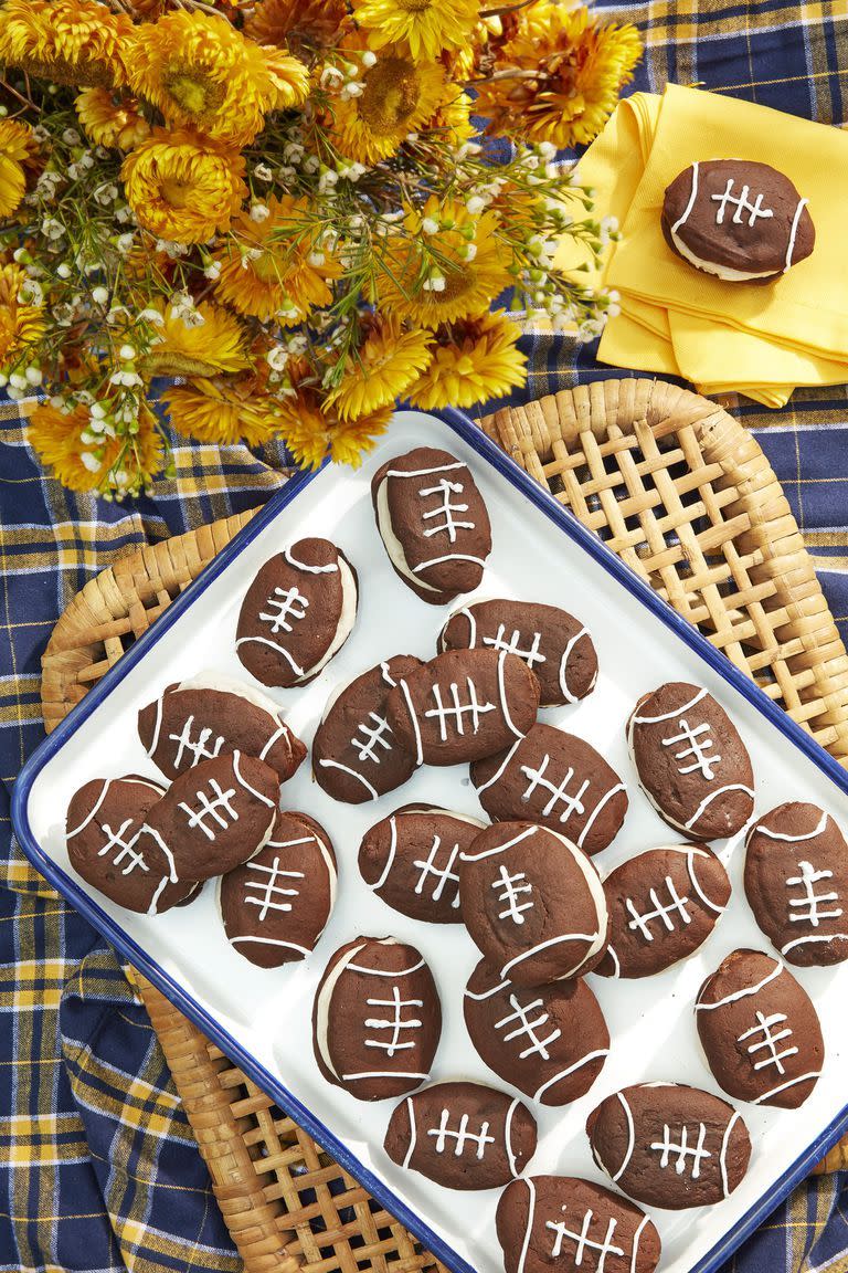 <p>Cheer on your team in the sweetest way with these chocolate whoopie pies. Everyone will feel like a winner as they enjoy every cream-filled bite.</p><p><strong><a href="https://www.countryliving.com/food-drinks/a24276425/football-whoopie-pies-with-cinnamon-cream/" rel="nofollow noopener" target="_blank" data-ylk="slk:Get the recipe;elm:context_link;itc:0;sec:content-canvas" class="link ">Get the recipe</a>.</strong></p>