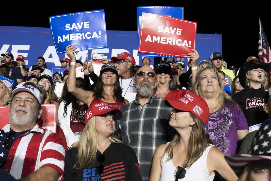 Republican supporters attend a rally Saturday for former President Donald Trump at the Minden Tahoe Airport near Lake Tahoe.