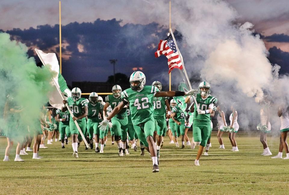 The Ashbrook football team takes the field ahead of their 2019 matchup with rival Forestview.