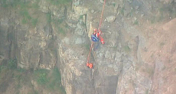 SES crews said the recovery mission down crumbling rocks was complex and dangerous, and they had to tread carefully to ensure their own safety. Source: ABC