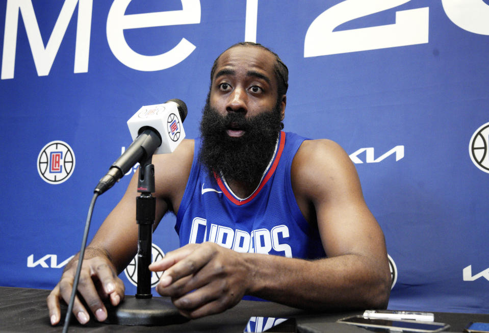 James Harden responds to a reporter's question as he is introduced as the newest member of the Los Angeles Clippers at a news conference at the NBA baketball team's training facility Thursday, Nov. 2, 2023, in Los Angeles. (AP Photo/Richard Vogel)