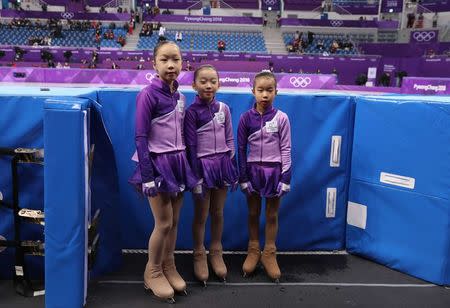 Ice girls, Kang Hae-bin (L-R), Oh Yu-jin and Youn Seo-jin are pictured at Gangneung Ice Arena during the Pyeongchang 2018 Winter Olympics in Pyeongchang, South Korea, February 20, 2018. REUTERS/Lucy Nicholson