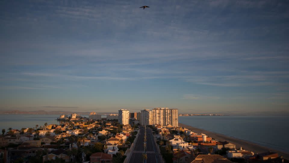 A strip of sand, known as La Manga, separates the lagoon from the Mediterranean Sea. Today, the strip is dense with buildings. - Jose Guerrero/AFP/Getty Images