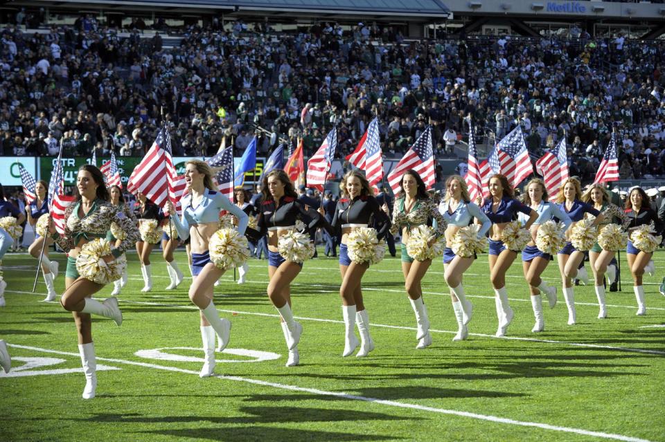 <p>New York Jets cheerleaders perform before an NFL football game against the Los Angeles Rams, Sunday, Nov. 13, 2016, in East Rutherford, N.J. (AP Photo/Bill Kostroun) </p>