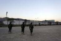 Soldiers patrol outside the Topo Chico prison in Monterrey, Mexico, February 11, 2016. REUTERS/Daniel Becerril