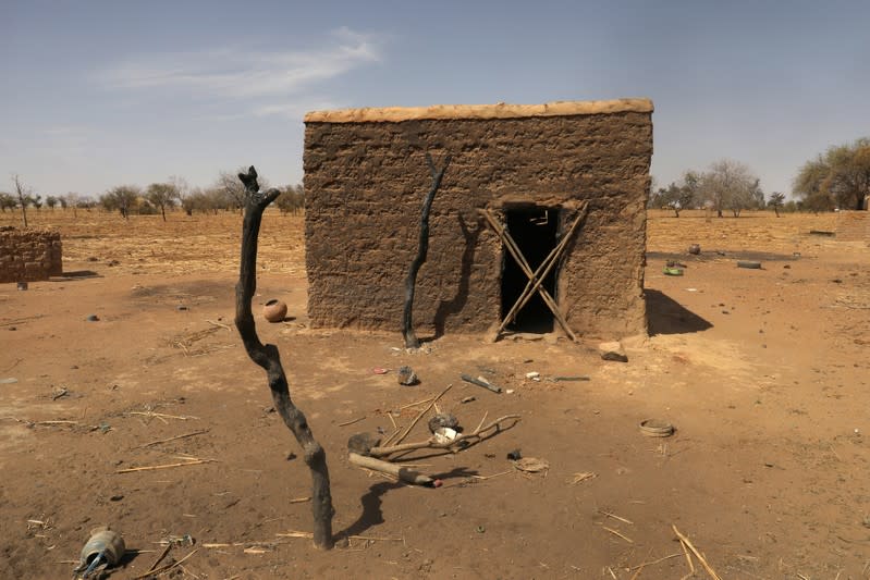 A burned and abandonned village is pictured on the road of Foube, Burkina Faso