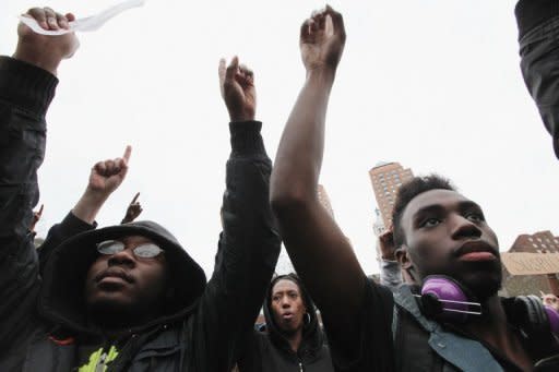 Supporters of Trayvon Martin rally in New York during a "Million Hoodie March" on March 21. The police chief at the center of a growing storm in the United States over the fatal shooting of an unarmed black teenager by a white crime watch volunteer stepped down temporarily Thursday