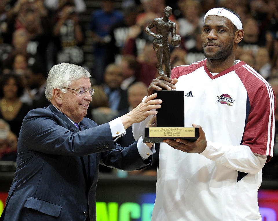 CLEVELAND - MAY 05: LeBron James #23 of the Cleveland Cavaliers receives 2008-2009 MVP trophy from NBA Commissioner David Stern prior to playing the Atlanta Hawks in Game One of the Eastern Conference Semifinals during the 2009 NBA Playoffs at Quicken Loans Arena on May 5, 2009 in Cleveland, Ohio.