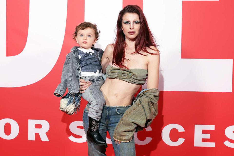 <p>Victor Boyko/Getty Images for Diesel</p> Julia Fox with son Valentino