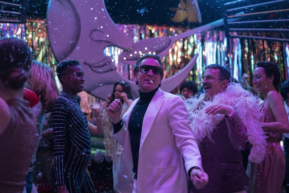 <div class="inline-image__caption"><p>Ewan McGregor as Halston, David Pittu as Joe Eula, and Rebecca Dayan as Elsa Peretti</p></div> <div class="inline-image__credit">ATSUSHI NISHIJIMA/NETFLIX</div>