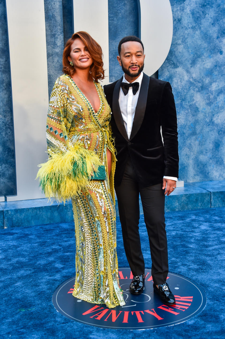 Chrissy Teigen and John Legend arrive at the 2023 Vanity Fair Oscar Party held at the Wallis Annenberg Center for the Performing Arts on March 12, 2023 in Beverly Hills, California.