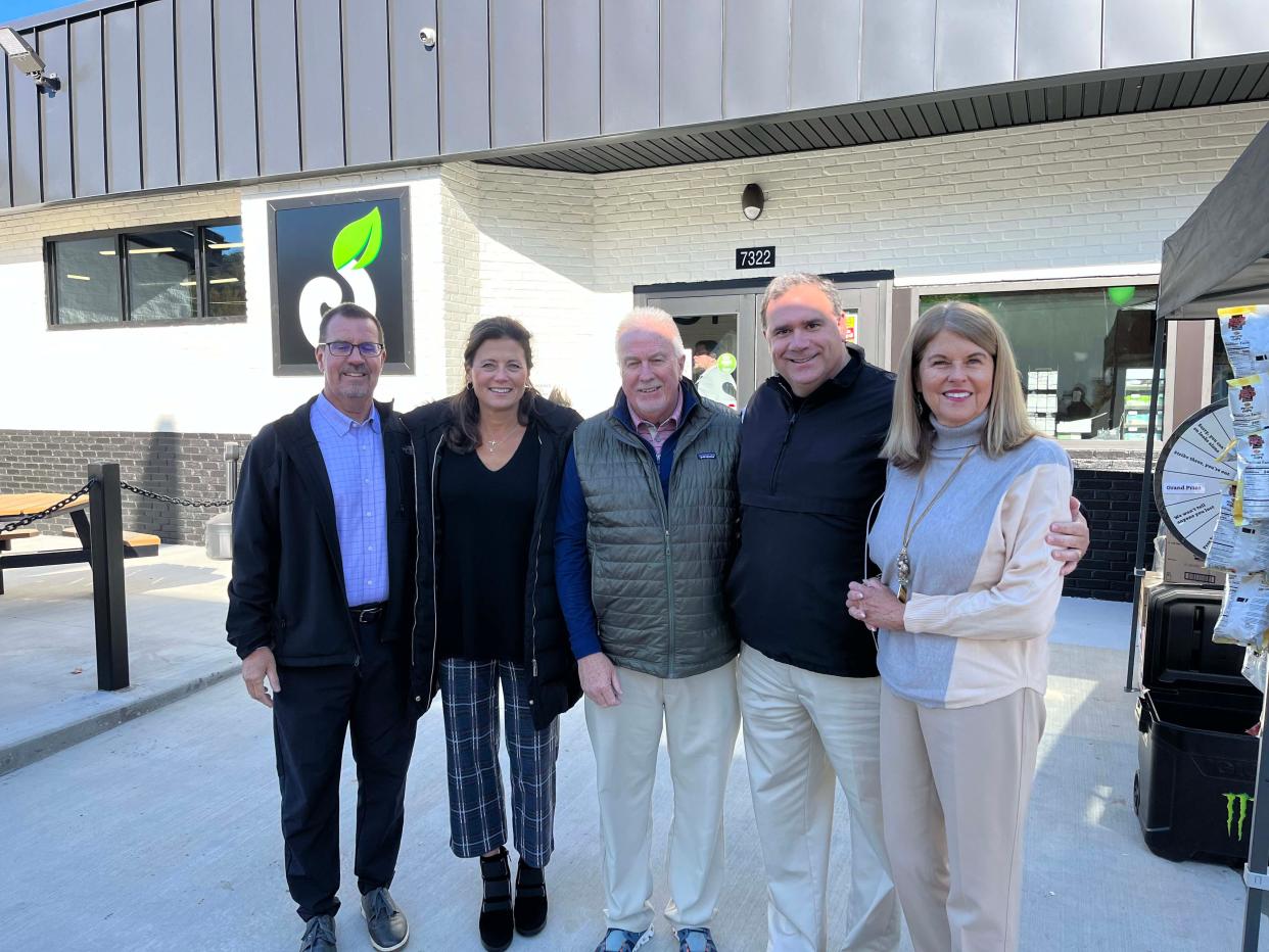 H.T. Hackney representatives Tom Degges, Kathryn Eggleston and Tommy Thomas with news personality Russell Biven and Commissioner Terry Hill attend the Nov. 2 grand reopening of the Local Market BP at 7322 Oak Ridge Hwy.