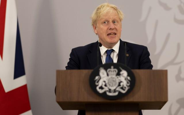 Boris Johnson insisted on getting on with the job as he gave a press conference in Kigali - Dan Kitwood/PA Wire