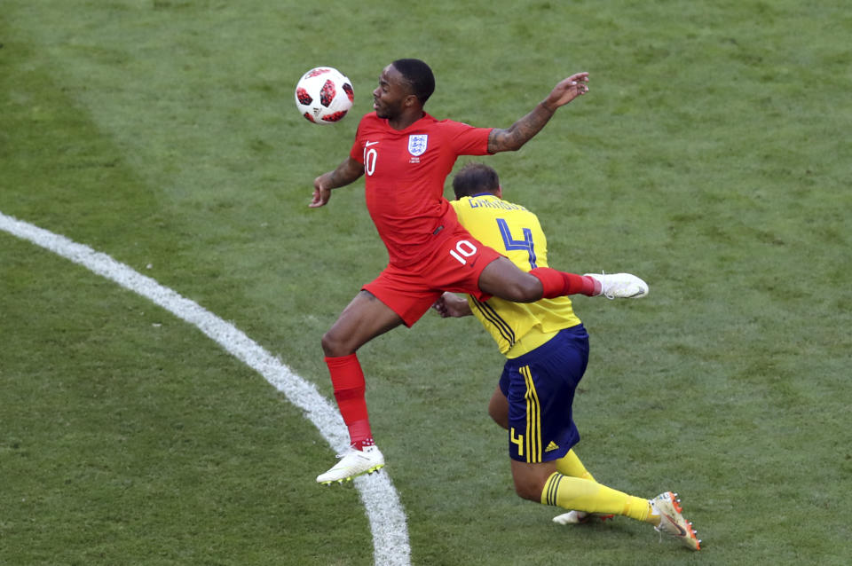 <p>England’s Raheem Sterling leaps over Sweden’s Andreas Granqvist </p>