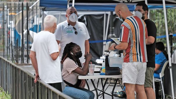 PHOTO: People line up to speak with healthcare workers at intake tents where individuals  register to receive the monkeypox vaccine on Aug. 5, 2022 in New York City.  (Spencer Platt/Getty Images)