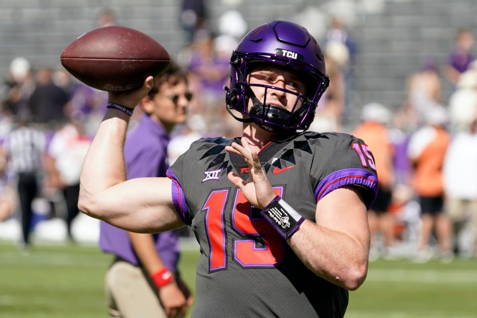 TCU quarterback Max Duggan warms up prior to an Oct. 15 game against Oklahoma State.