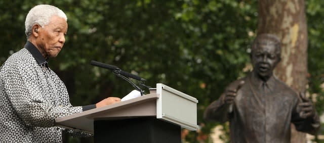 Nelson Mandela speaking to the crowds as a statue is unveiled in his honour in Parliament Square (Daniel Berehulak/AP)