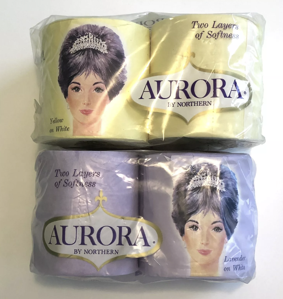 Two packs of Aurora by Northern toilet paper, one yellow with 