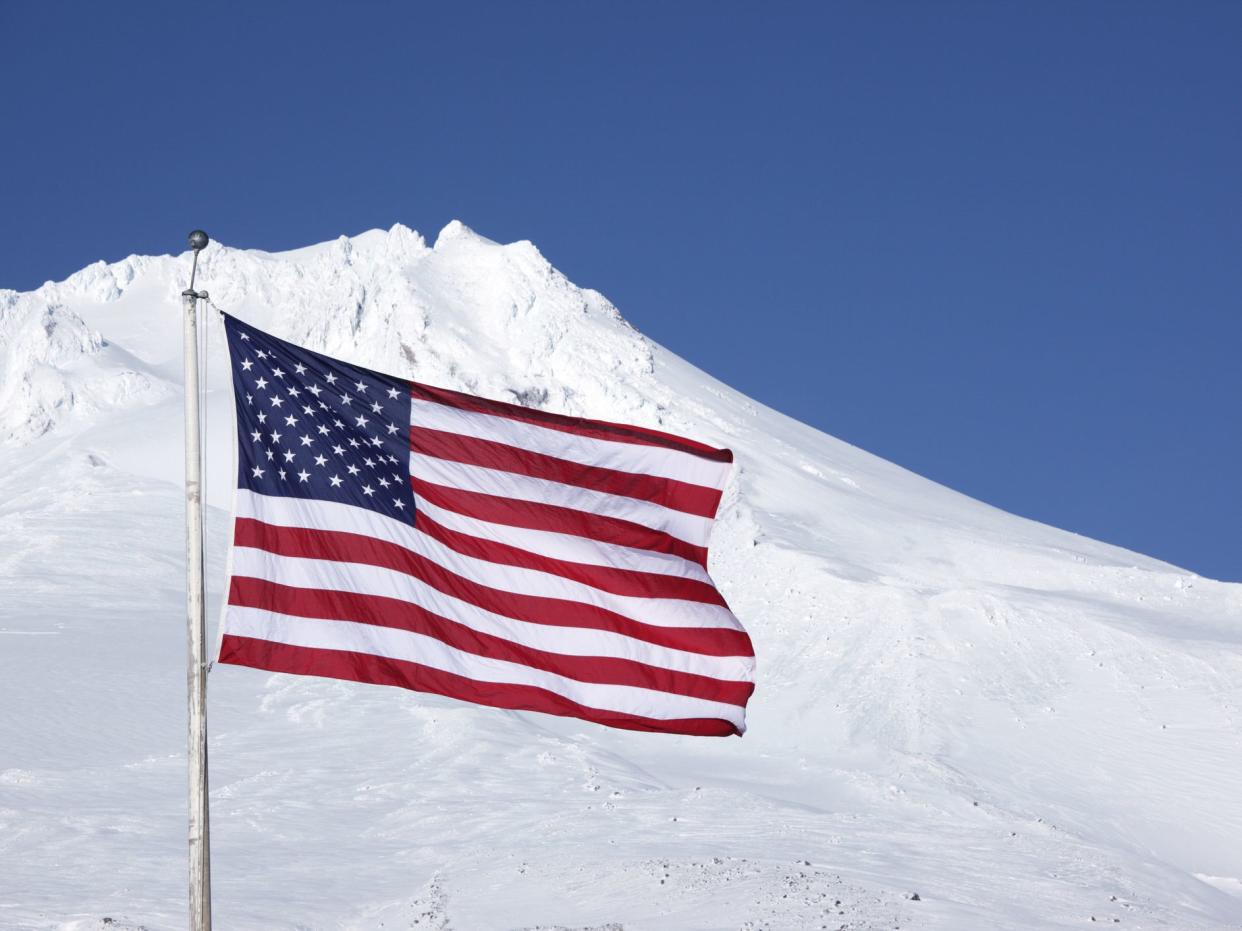 "A US flag flying on the flanks of Mt Hood, Oregon."