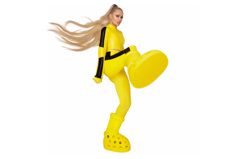 That's, Hot? Paris Hilton Models MSCHF x Crocs' Big Yellow Boots