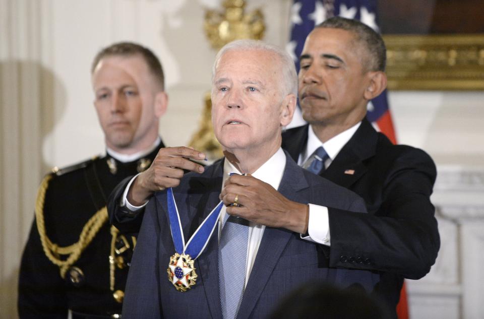 Jan. 12, 2017: President Barack Obama (right) presents the Medal of Freedom to Vice President Joe Biden during an event in the State Dining Room of the White House in Washington.