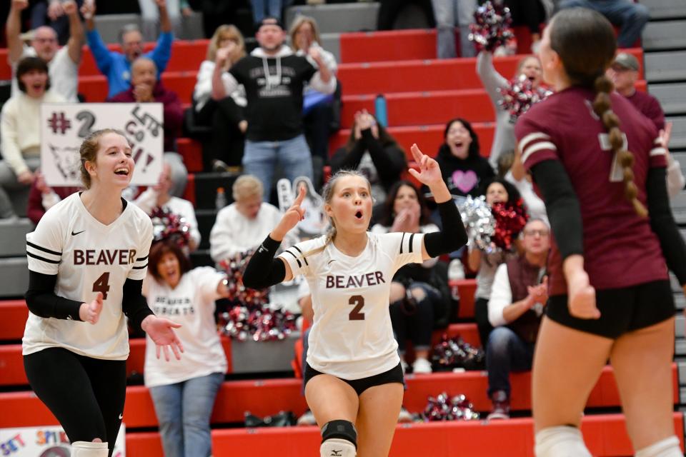Beaver's Zoe Ringer and Sophia Sharpless react to a point for the Bobcats during the Class 2A WPIAL volleyball championship match against Freeport, Saturday at Peters Township High School.