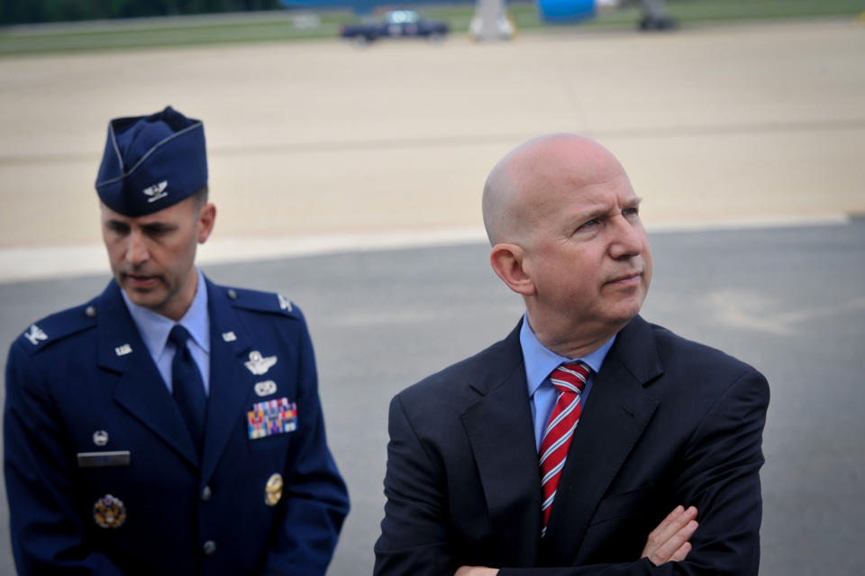 Delaware Gov. Jack Markell, right, and Col. Don Bevis, left, await the arrival of President Barack Obama on Air Force One at New Castle Air National Guard Base in New Castle, Del., Saturday, June 6, 2015, before attending a funeral for Beau Biden. Biden, the eldest son of Vice President Joe Biden, died of brain cancer May 30 at age 46. (AP Photo/Emily Varisco)