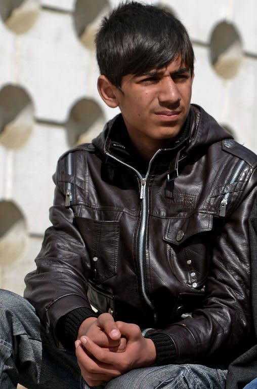 Afghan actor Fawad Mohammadi during an interview with AFP in Kabul on February 9, 2013. Mohammadi, 14, was selling maps to passing foreigners on Kabul's Chicken Street to help feed his family when he met US director Sam French