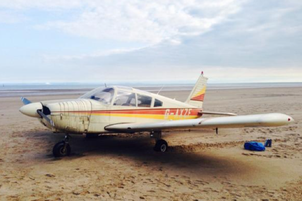 Plane crash-lands on beach in Swansea