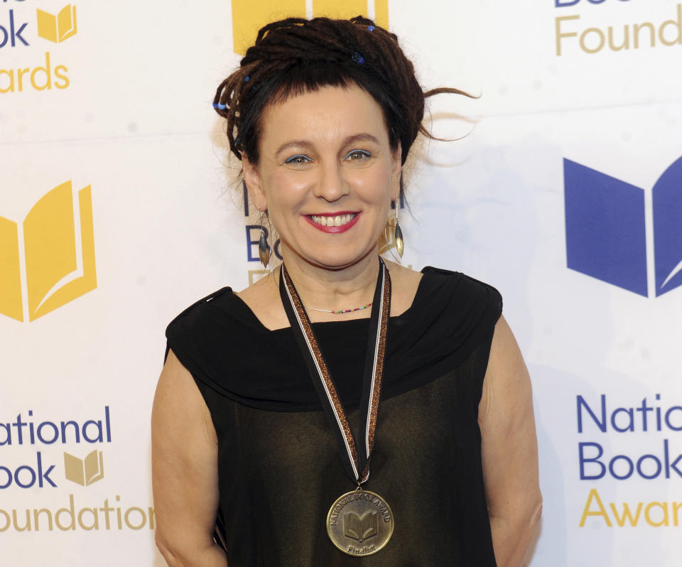 FILE - This Nov. 14, 2018 file photo shows Polish author Olga Tokarczuk at the 69th National Book Awards Ceremony and Benefit Dinner in New York. Olga Tokarczuk is named recipient of the 2018 Nobel Prize in Literature, Thursday Oct. 10, 2019. Two Nobel Prizes in literature are announced Thursday after the 2018 literature award was postponed following sex abuse allegations that rocked the Swedish Academy at that time. (Photo by Brad Barket/Invision/AP, File)