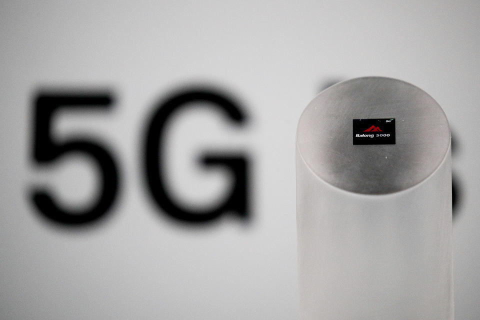 Huawei 5G modem Balong 5000 chipset is displayed after the presentation event in Beijing, Thursday, Jan. 24, 2019. Chinese tech giant Huawei has announced plans to release a next-generation smartphone based on its own technology instead of U.S. components, stepping up efforts to compete with global industry leaders. (AP Photo/Andy Wong)