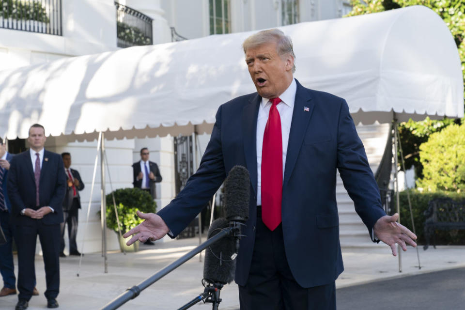 U.S. President Donald Trump speaks to members of the media on Saturday. Source: Getty