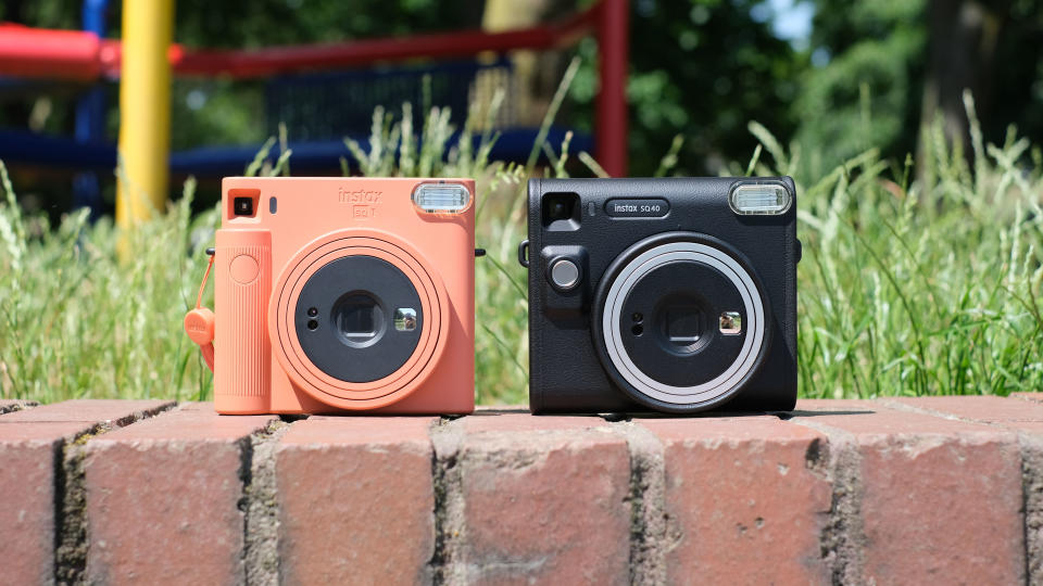 Fujifilm Instax SQ1 next to the Instax SQ40 instant film cameras